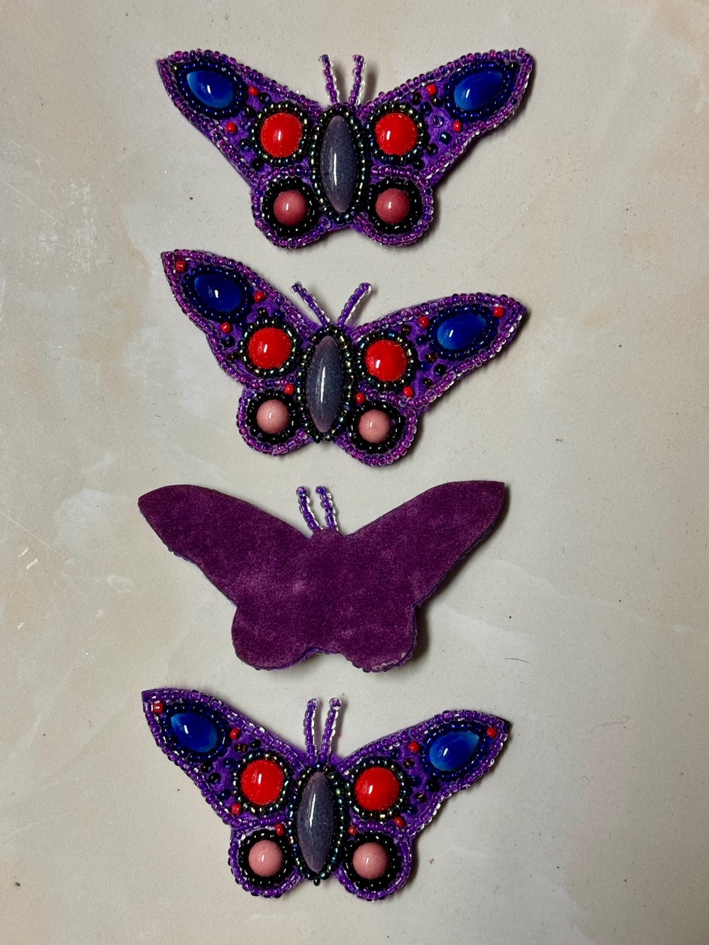 Purple Beaded Butterfly Appliqués - Pack of 4. Perfect for decorating or craftin